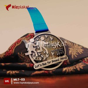 medali logam run